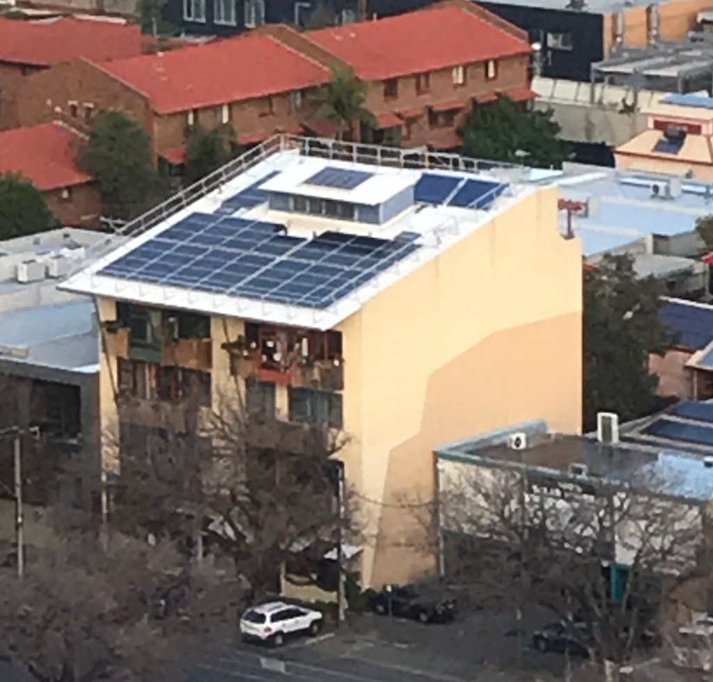 Pulling down the old PVs and moving the new 2m x 1m panels onto the roof was a logistical headache.